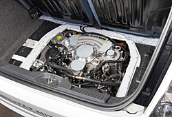 Range Extender-Modul in Reserveradmulde